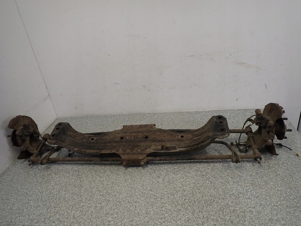 MAZDA PREMACY 323 BJ 98-03 BELKA ZAWIESZENIA TYŁ TRACZE 1/11