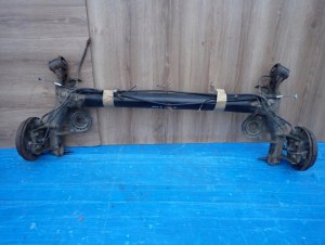 SUZUKI SWIFT MK7 10- BELKA ZAWIESZENIE TYŁ BĘBNY