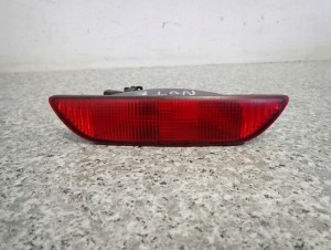 NISSAN NOTE E11 LIFT 09-12 LAMPA PRZECIWMGIELNA TYŁ
