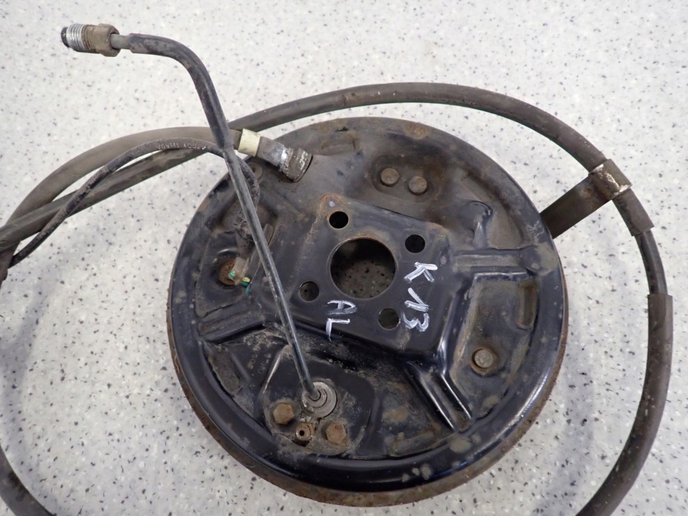 NISSAN MICRA K13 10- TARCZA KOTWICZNA TYLNA LEWA SZCZĘKI 4/4