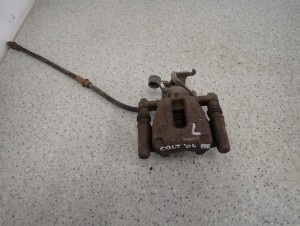 MITSUBISHI COLT CZ3 04-12 ZACISK HAMULCOWY TYLNY LEWY 4/4 MINIATURA