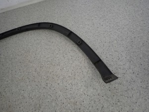 SUZUKI IGNIS 00-03 LISTWA BŁOTNIKA TYLNA LEWA 8/13 MINIATURA