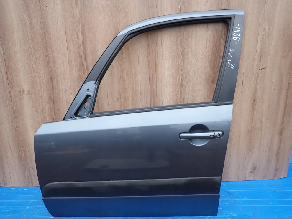 SUZUKI SX4 06-12 DRZWI PRZEDNIE LEWE ZY4 1/10