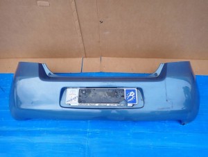 TOYOTA YARIS II 06-09 ZDERZAK TYLNY 8T1