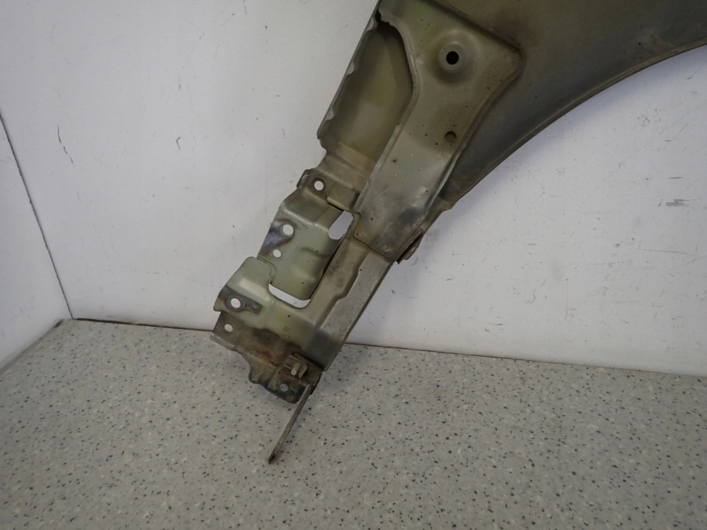 SUZUKI GRAND VITARA II 05 - BŁOTNIK PRZEDNI LEWY ZDL 10/10