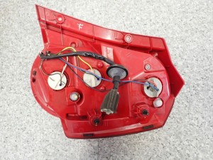 CHEVROLET AVEO T250 07- LAMPA TYLNA LEWA 10/10 MINIATURA