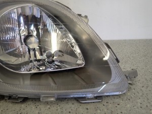 TOYOTA YARIS 99- LAMPA PRZEDNIA PRAWA REFLEKTOR FR 4/15 MINIATURA