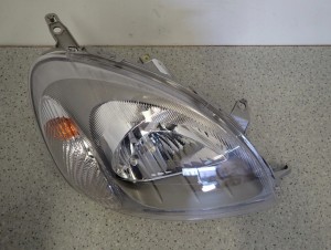 TOYOTA YARIS 99- LAMPA PRZEDNIA PRAWA REFLEKTOR FR 7/15 MINIATURA