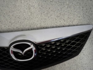 MAZDA 2 MAZDA2 DY 05-07 ATRAPA GRILL KRATA WLOTU 7/10 MINIATURA