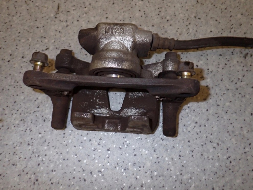 MITSUBISHI GRANDIS 03-11 ZACISK HAMULCOWY TYLNY LEWY 3/6