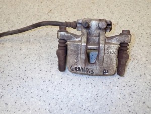 MITSUBISHI GRANDIS 03-11 ZACISK HAMULCOWY TYLNY LEWY