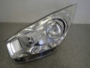 KIA VENGA 09- LAMPA PRZEDNIA LEWA