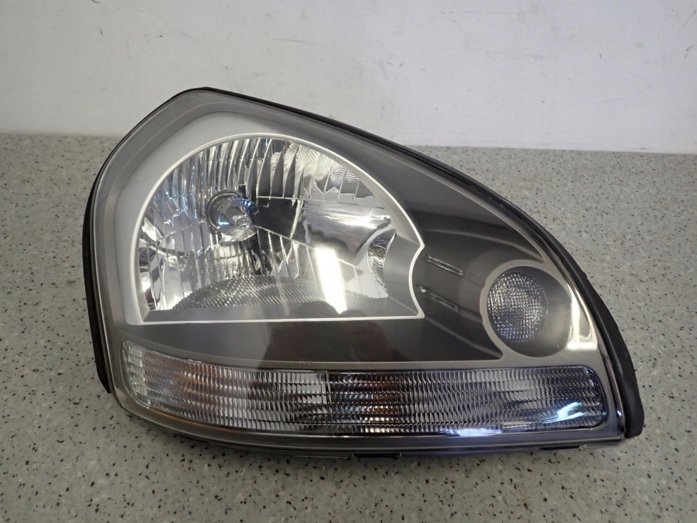 HYUNDAI TUCSON 04-10 REFLEKTOR PRZEDNI PRAWY LAMPA PRZÓD 1/11