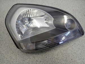 HYUNDAI TUCSON 04-10 REFLEKTOR PRZEDNI PRAWY LAMPA PRZÓD 4/11 MINIATURA