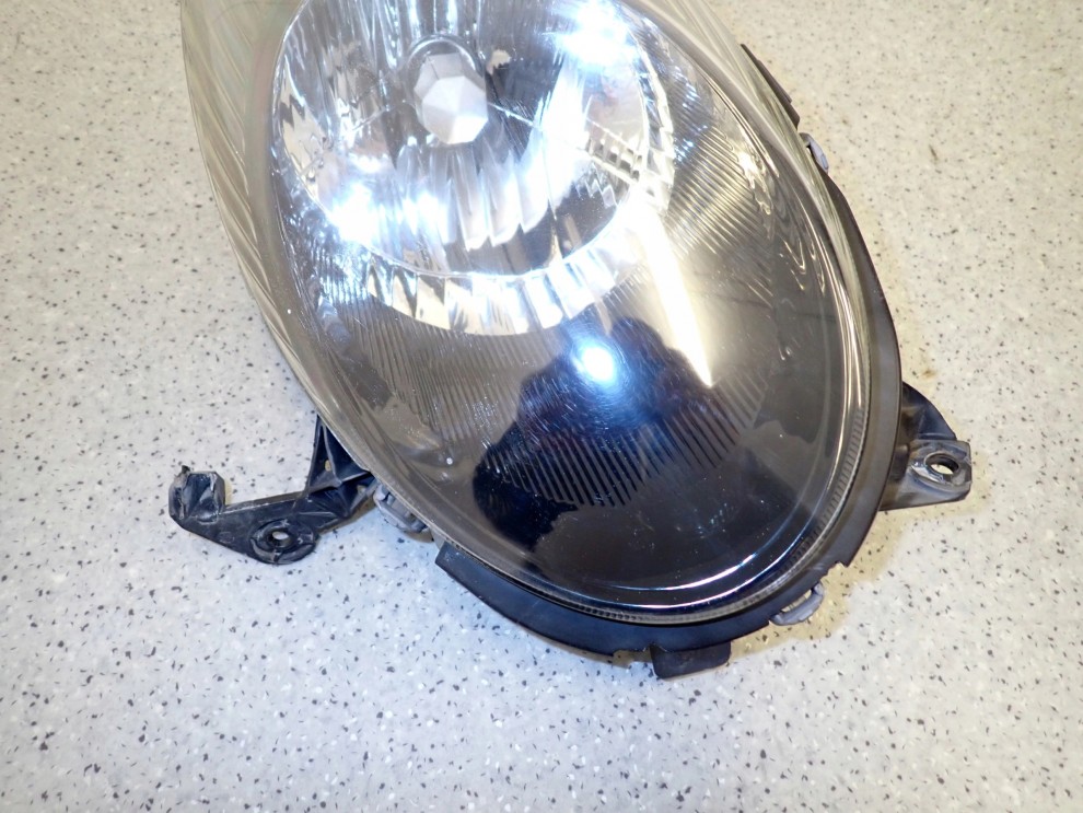 NISSAN MICRA K12 06-08 REFLEKTOR PRAWY LAMPA PRZEDNIA 2/12