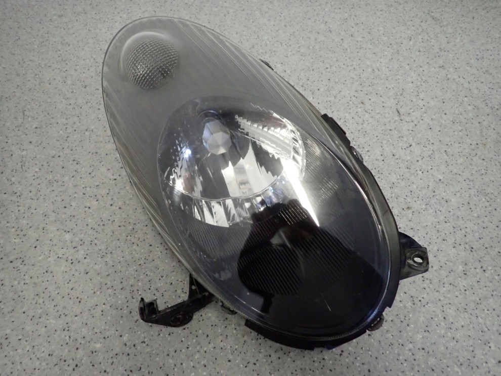 NISSAN MICRA K12 06-08 REFLEKTOR PRAWY LAMPA PRZEDNIA 3/12