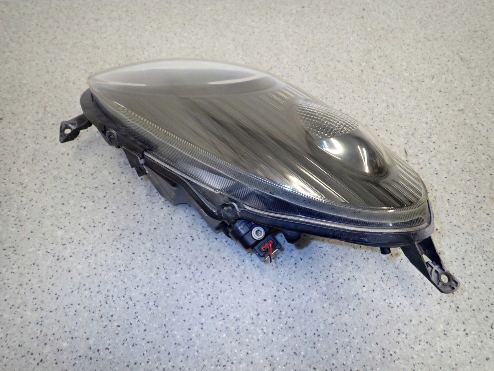 NISSAN MICRA K12 06-08 REFLEKTOR PRAWY LAMPA PRZEDNIA 7/12