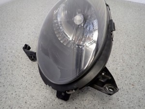 NISSAN MICRA K12 06-08 REFLEKTOR PRAWY LAMPA PRZEDNIA 4/12 MINIATURA
