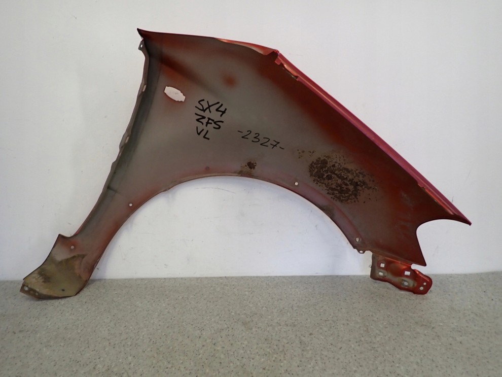 SUZUKI SX4 06-12 BŁOTNIK PRZEDNI LEWY ZFS 10/10