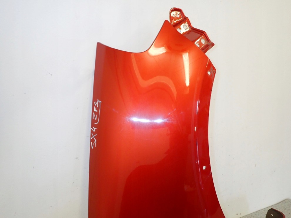 SUZUKI SX4 06-12 BŁOTNIK PRZEDNI PRAWY ZFS 8/10