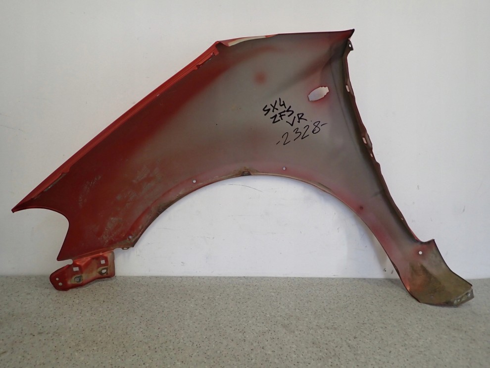 SUZUKI SX4 06-12 BŁOTNIK PRZEDNI PRAWY ZFS 10/10