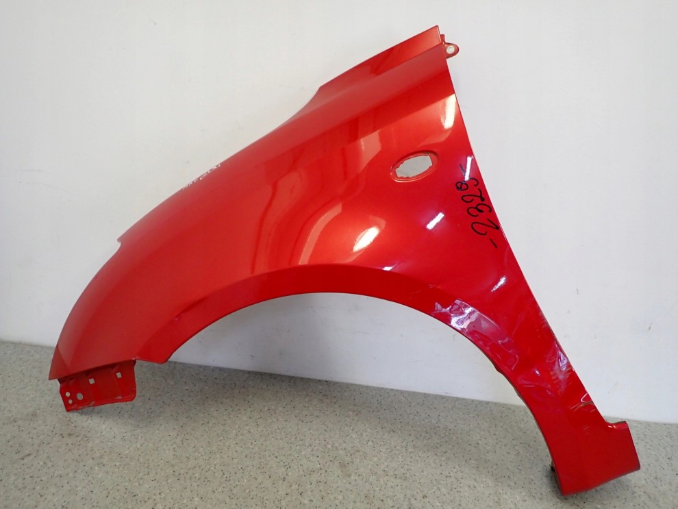 SUZUKI SWIFT MK6 05-09 BŁOTNIK PRZEDNI LEWY ZCK 2/15