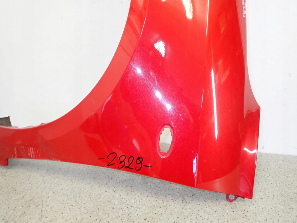 SUZUKI SWIFT MK6 05-09 BŁOTNIK PRZEDNI LEWY ZCK 12/15