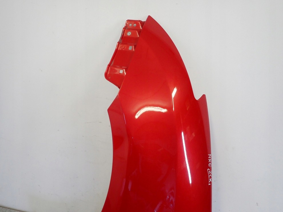 SUZUKI SWIFT MK6 05-09 BŁOTNIK PRZEDNI LEWY ZCK 13/15