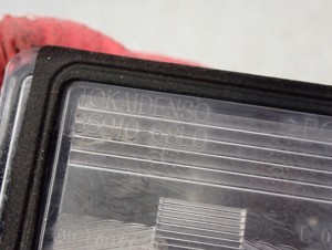 SUZUKI SWIFT MK7 10- LAMPKA OŚWIETLENIA TABLICY REJESTRACYJNEJ 3/5 MINIATURA