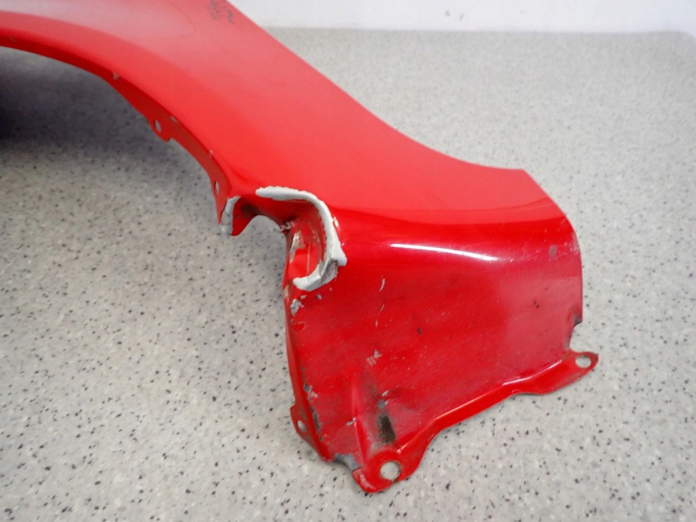 MITSUBISHI COLT 3d 04-08 BŁOTNIK PRZEDNI LEWY P04 9/11