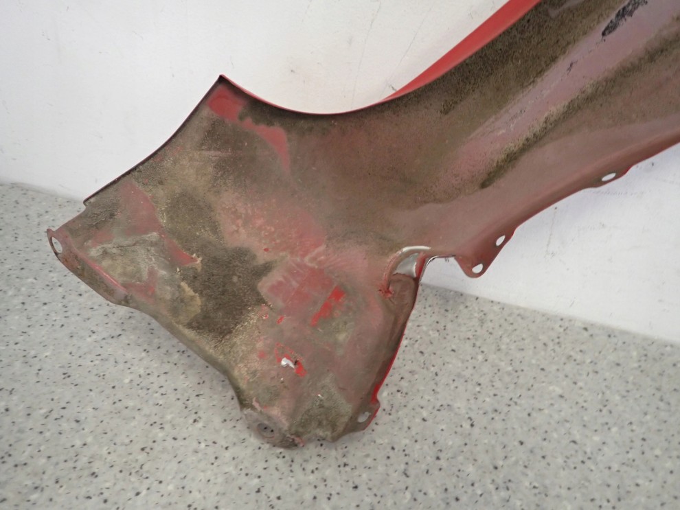 MITSUBISHI COLT 3d 04-08 BŁOTNIK PRZEDNI LEWY P04 11/11