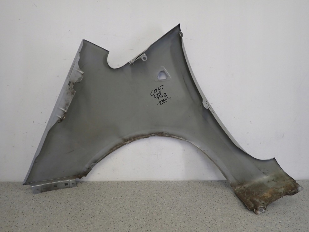 MITSUBISHI COLT 5d 04-08 BŁOTNIK PRZEDNI PRAWY T42 12/13