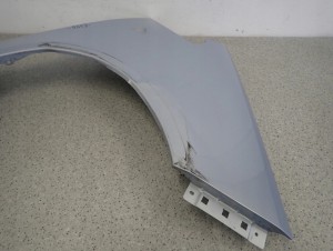 MITSUBISHI COLT 5d 04-08 BŁOTNIK PRZEDNI PRAWY T42 10/13 MINIATURA