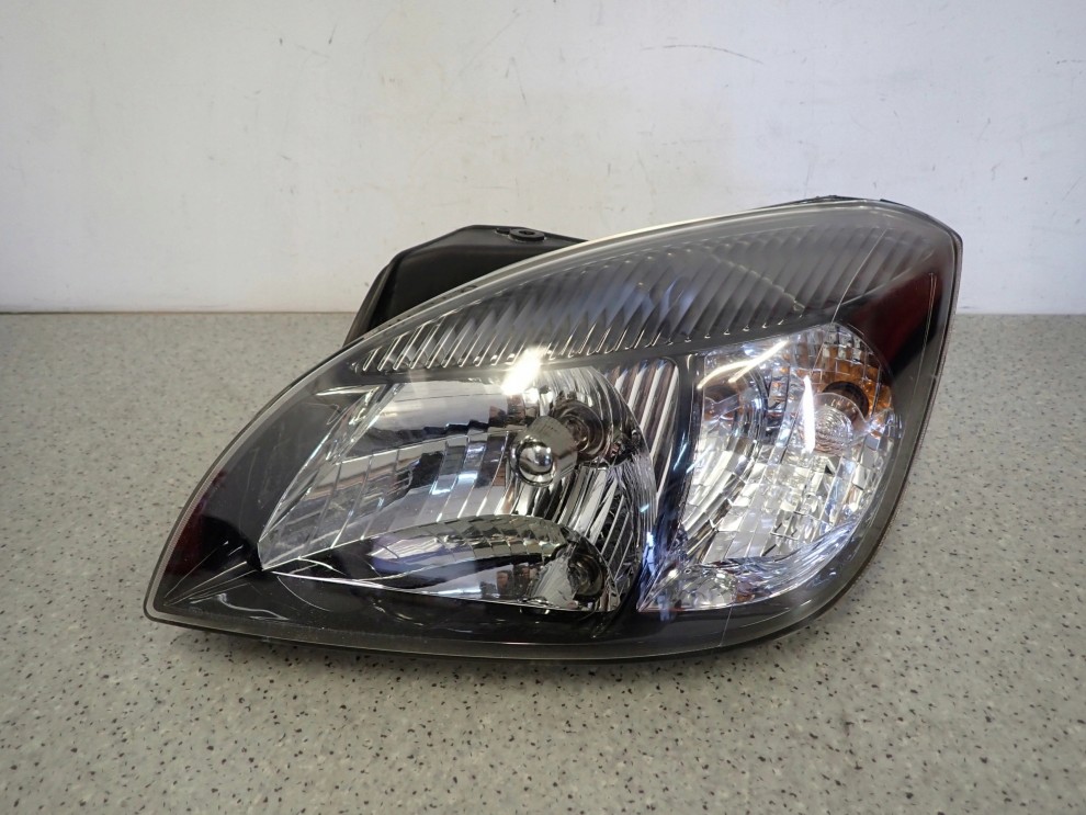 KIA RIO II 10-12 REFLEKTOR LEWY LAMPA PRZEDNIA LEWA 8/14
