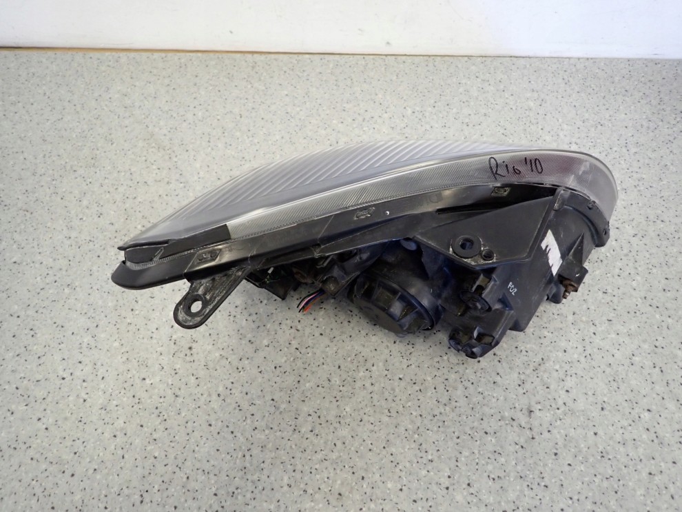 KIA RIO II 10-12 REFLEKTOR LEWY LAMPA PRZEDNIA LEWA 12/14