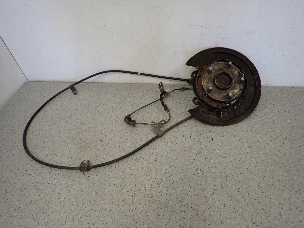 TOYOTA COROLLA VERSO 04- TARCZA KOTWICZNA PIASTA TYLNA LEWA 2/12