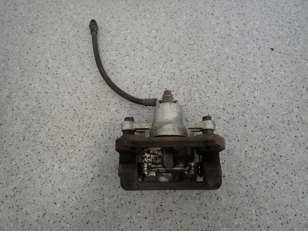 HYUNDAI i30 KIA CEED 07-12 ZACISK HAMULCOWY TYLNY LEWY 5/6