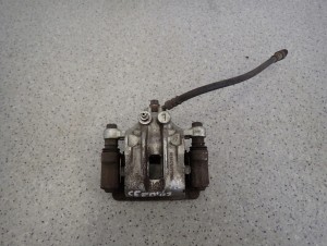 HYUNDAI i30 KIA CEED 07-12 ZACISK HAMULCOWY TYLNY LEWY