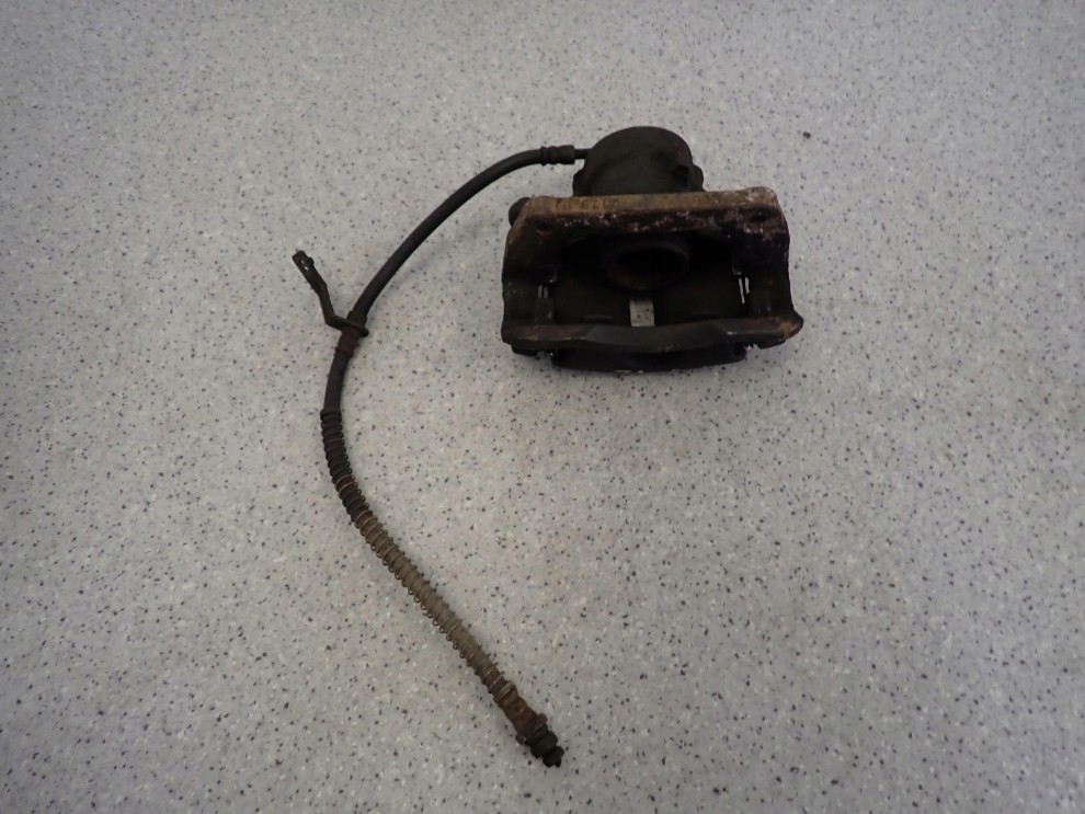 KIA VENGA 09- ZACISK HAMULCOWY PRZEDNI LEWY 4/7