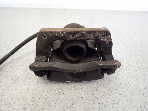 KIA VENGA 09- ZACISK HAMULCOWY PRZEDNI LEWY 6/7 MINIATURA