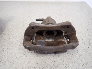 CHEVROLET CRUZE BENZYNA 08- ZACISK PRZEDNI LEWY 3/5 MINIATURA