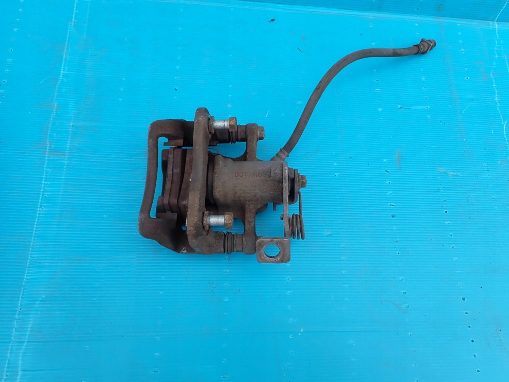 KIA RIO III HB 11-14 ZACISK TYLNY LEWY 2/3