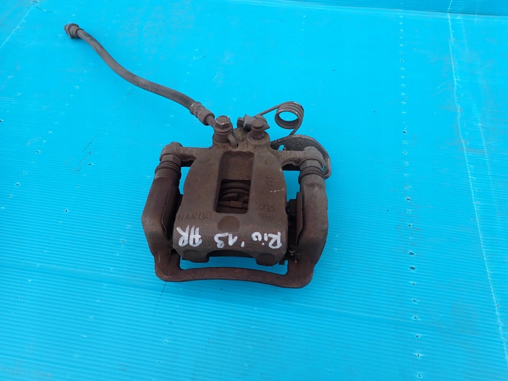 KIA RIO III HB 11-14 ZACISK TYLNY PRAWY 1/4