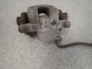 TOYOTA VERSO 09- 2.0D ZACISK TYLNY LEWY 5/7 MINIATURA