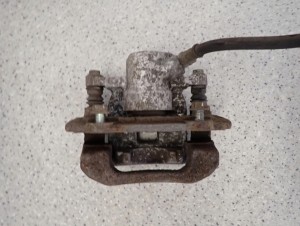 TOYOTA VERSO 09- 2.0D ZACISK TYLNY LEWY 7/7 MINIATURA