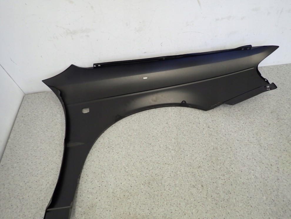 SUZUKI BALENO 95-99 BŁOTNIK PRZEDNI LEWY NOWY 9/12