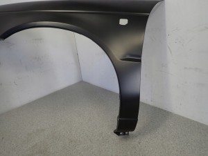 SUZUKI BALENO 95-99 BŁOTNIK PRZEDNI LEWY NOWY 4/12 MINIATURA