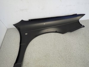 SUZUKI BALENO 95-99 BŁOTNIK PRZEDNI LEWY NOWY 9/12 MINIATURA