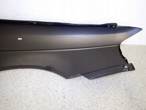 SUZUKI BALENO 95-99 BŁOTNIK PRZEDNI LEWY NOWY 10/12 MINIATURA