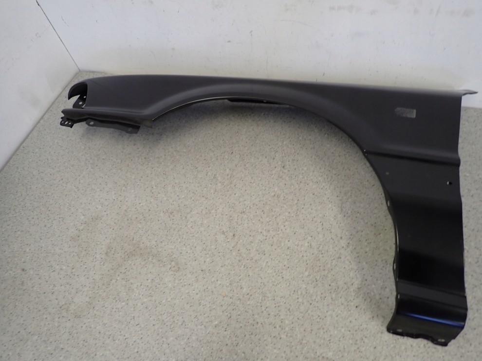 MITSUBISHI GALANT 88-92 BŁOTNIK PRZEDNI LEWY NOWY ORYGINAŁ 3/15